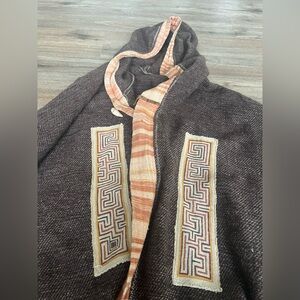 Brown Hooded Jacket with Geometric Patterns